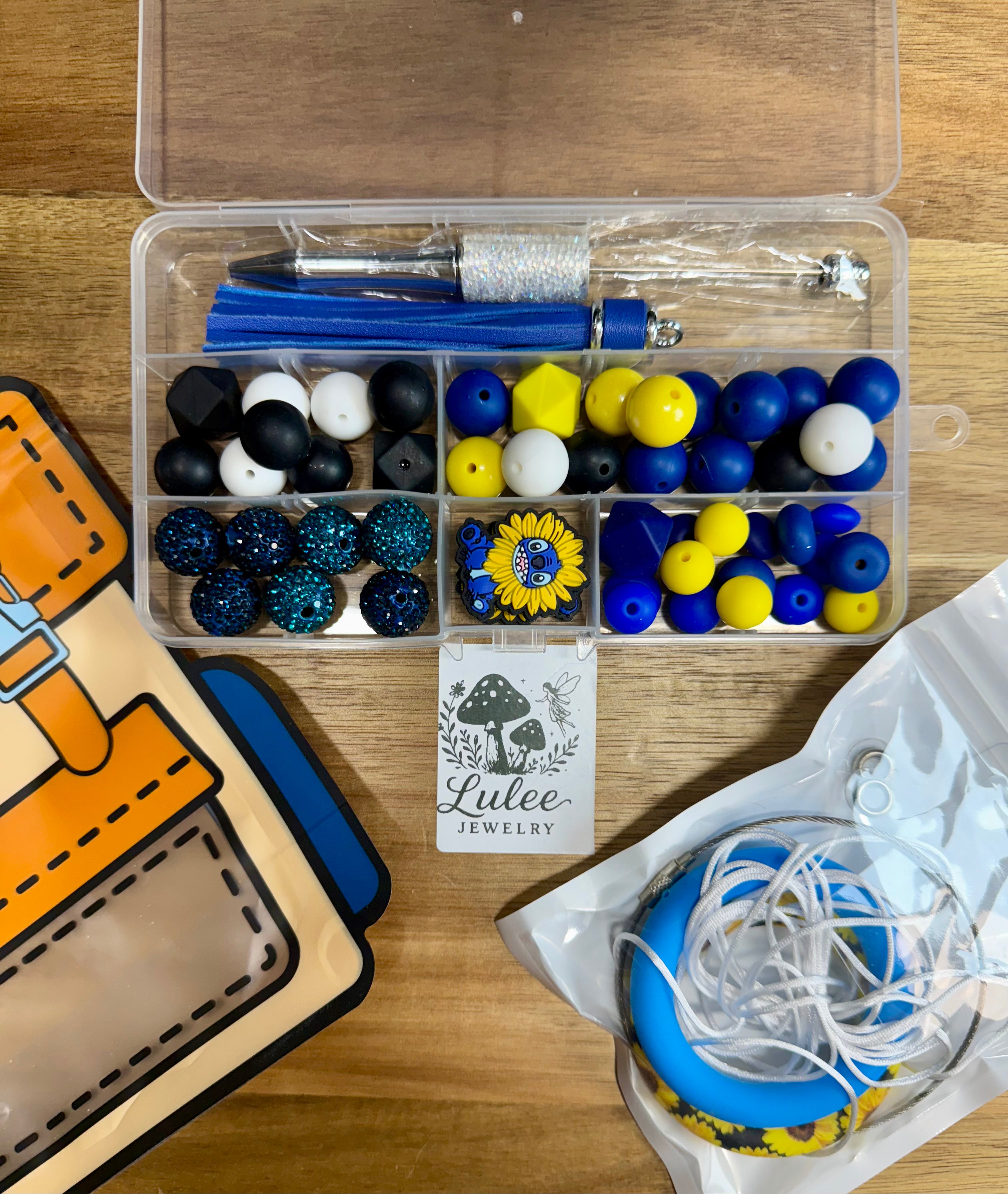 Pen/wristlet/car charm kit